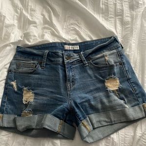 Distressed denim shorts
